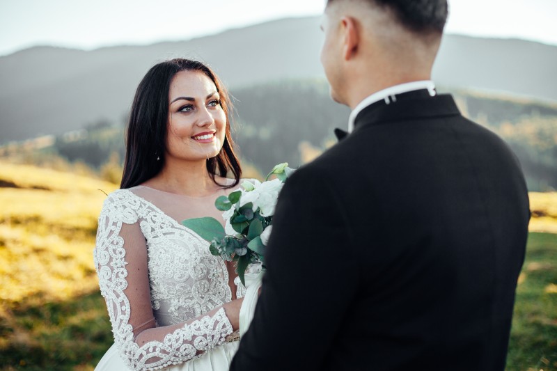 a couple exchanging vows in an enchanting place